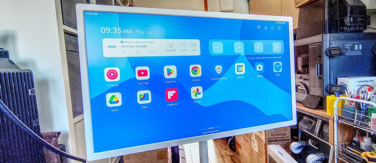 Apolosign 32-inch Smart Portable TV standing on its wheeled base showing a 4K Android interface