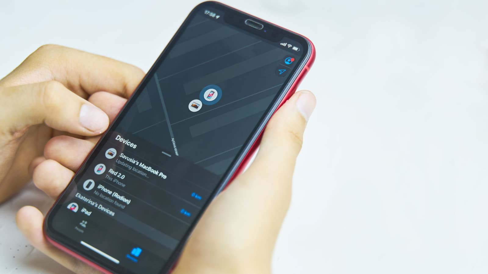 iPhone with Find My app showing location tracking even when device is off