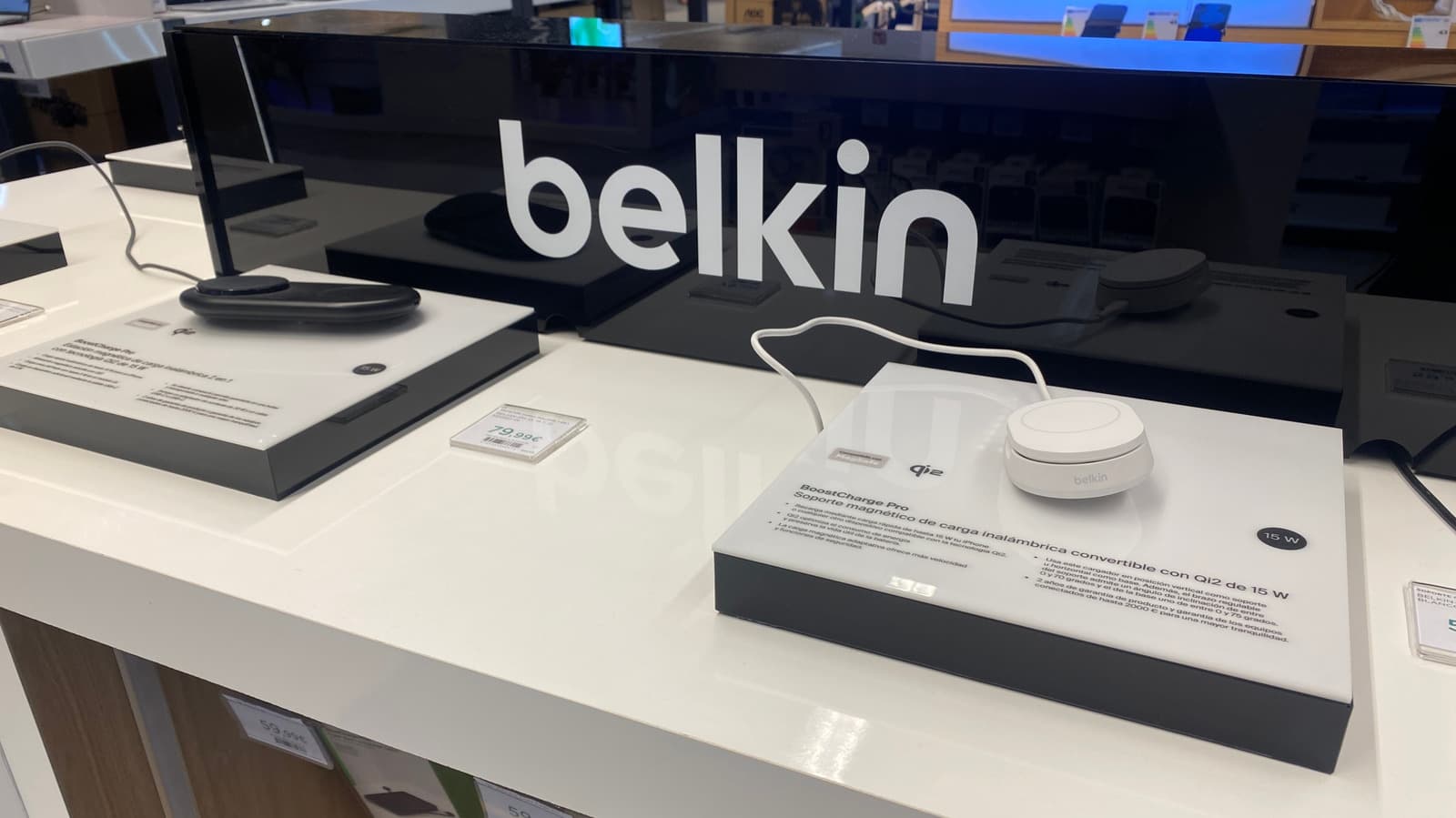 Belkin BoostCharge Pro wireless charger and other accessories on a desk