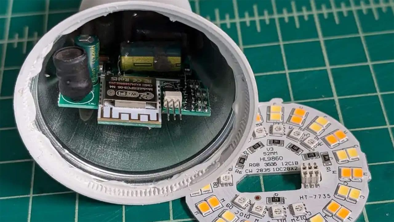 A Wi-Fi smart lightbulb with a glowing filament, representing the hacked device that hosts a banned book library.
