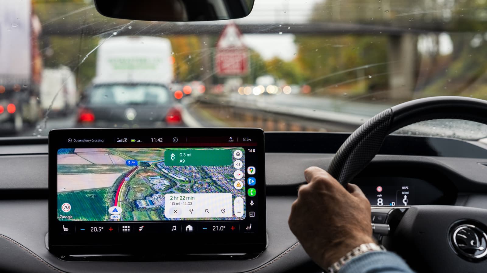 Google Maps navigation screen showing green and red ETA colors on a city route