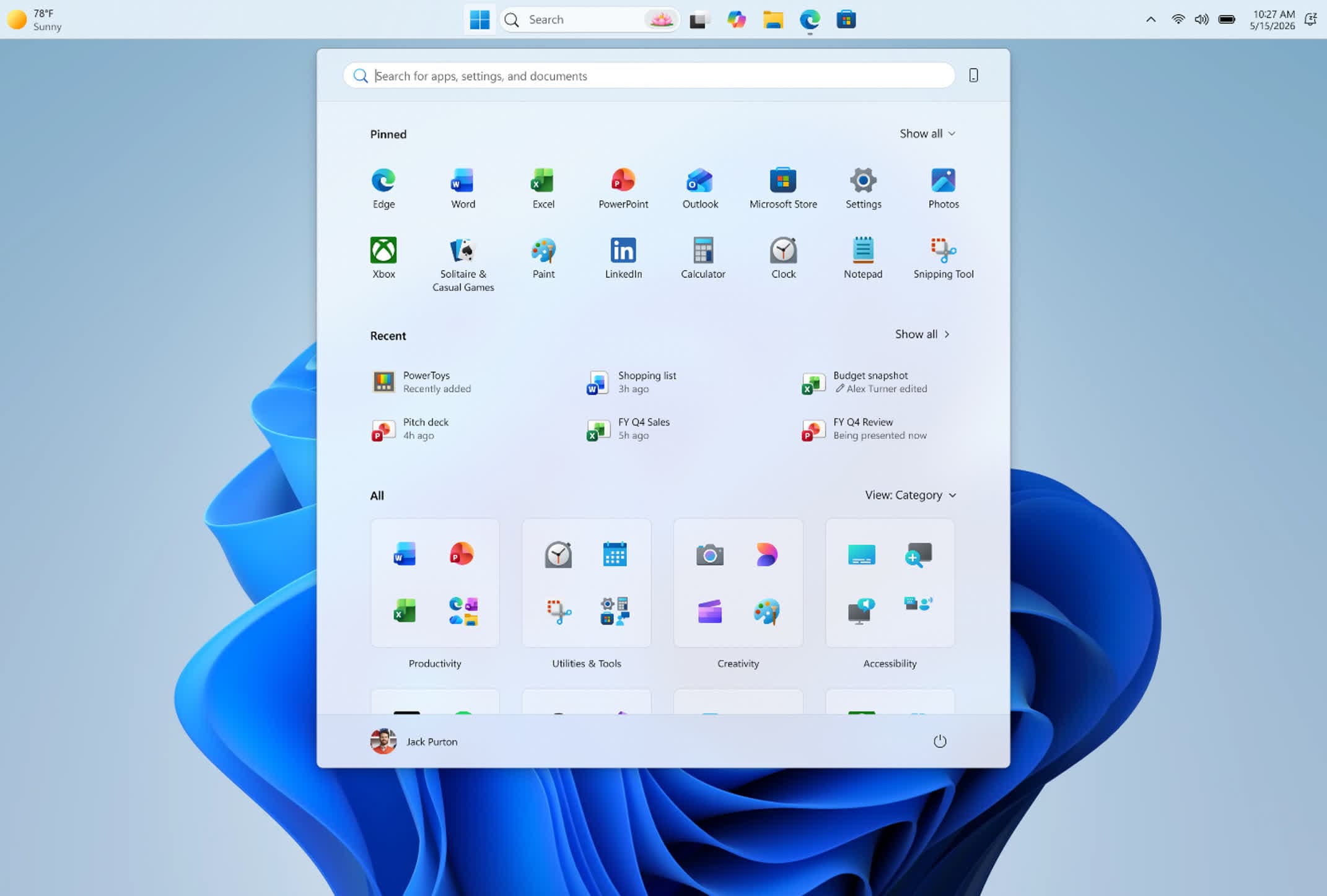 Windows 11 desktop with taskbar and Start menu customization options visible