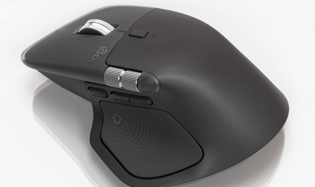 Logitech computer mouse and keyboard on a desk with a legal document background