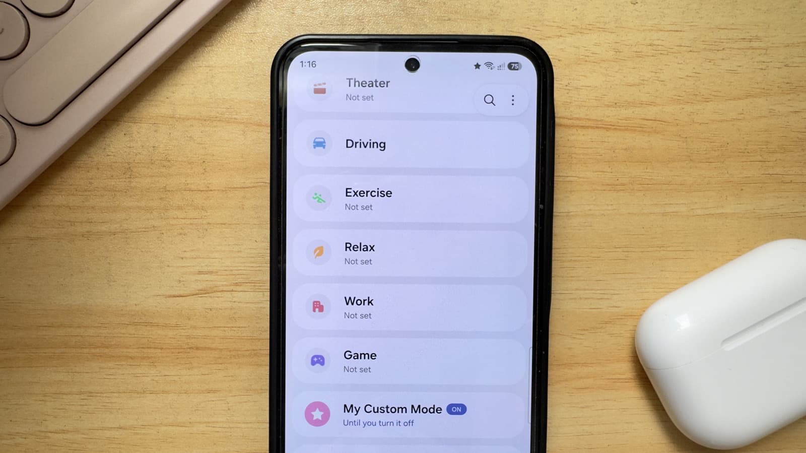 Samsung phone screen showing Custom Modes settings for Work, Sleep and Exercise profiles