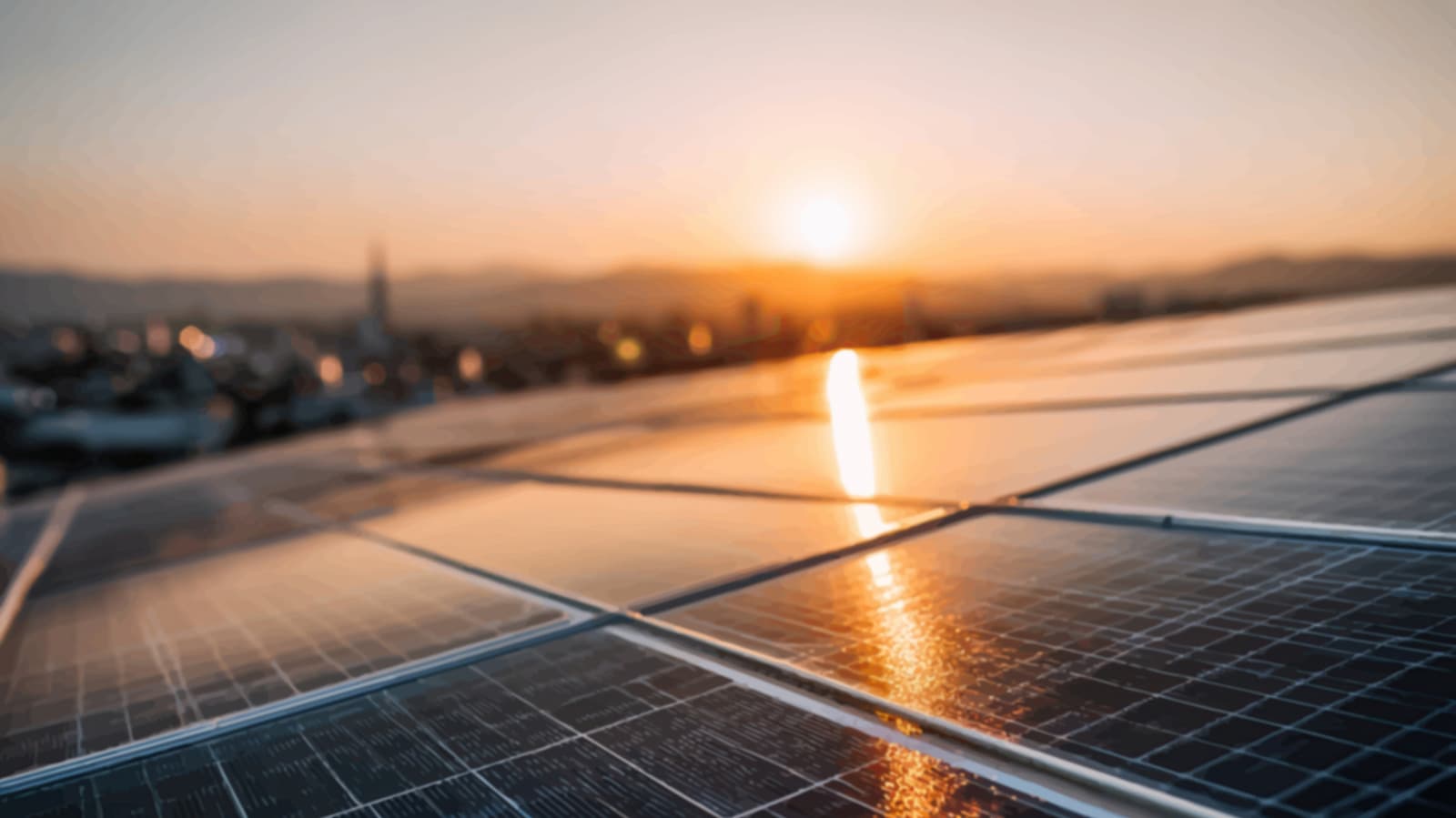 Solar panels on a residential roof under a bright sun on a hot day, indicating heatwave conditions