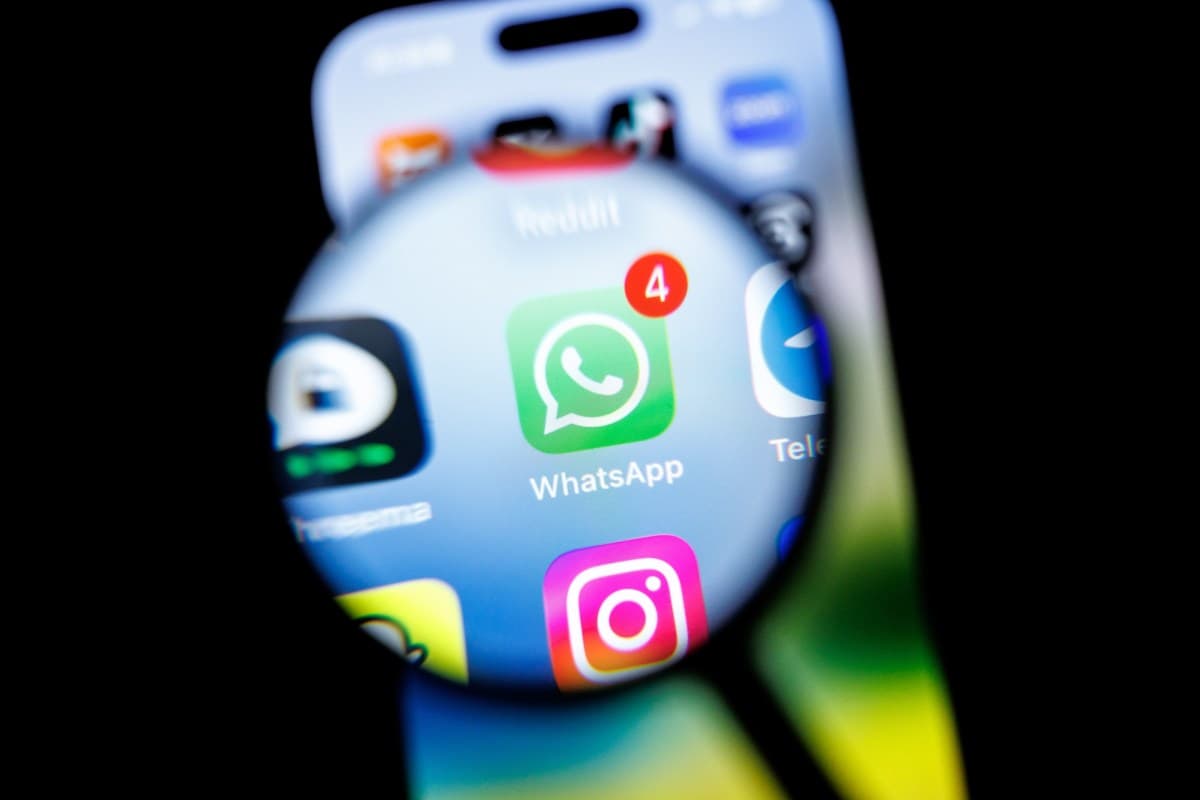 WhatsApp app icon on a smartphone screen showing a lock symbol