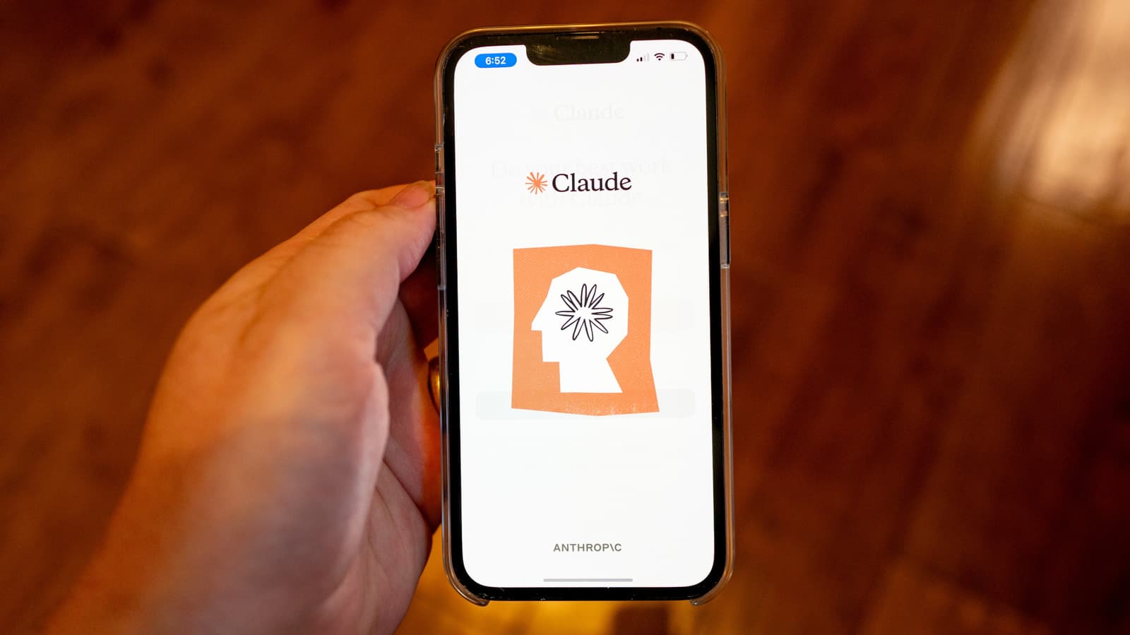 Anthropic logo and AI chatbot interface representing corporate governance of Claude