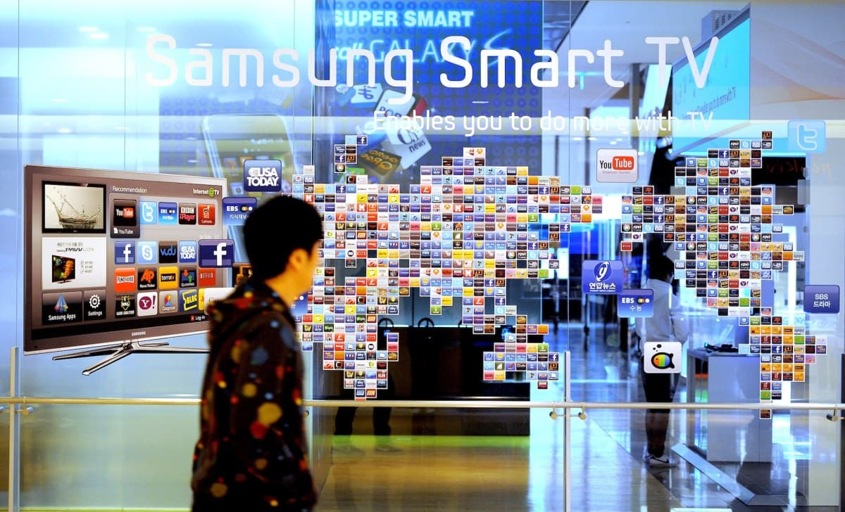 A smart TV device displaying a warning icon about internet connection sharing risks