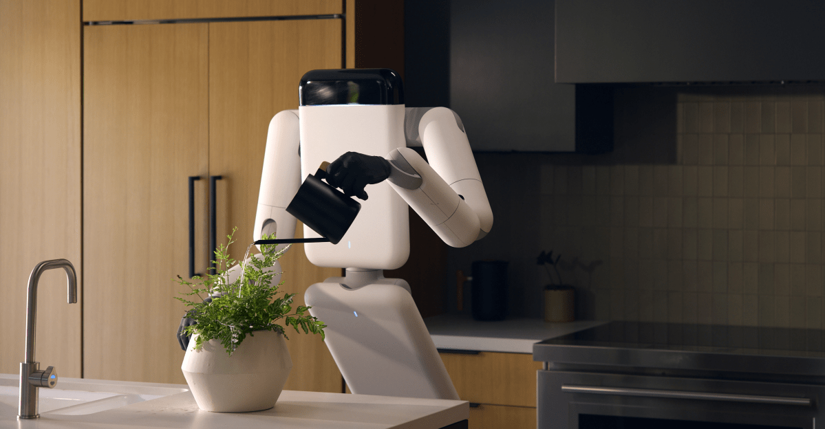 A wheeled robotic arm system called Eno designed by Genesis AI folds down like furniture