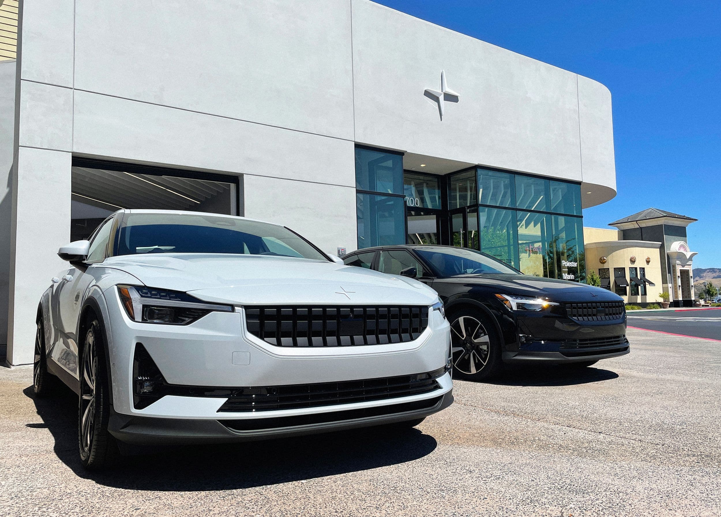 Polestar electric car showroom with dealership signage and vehicles on display