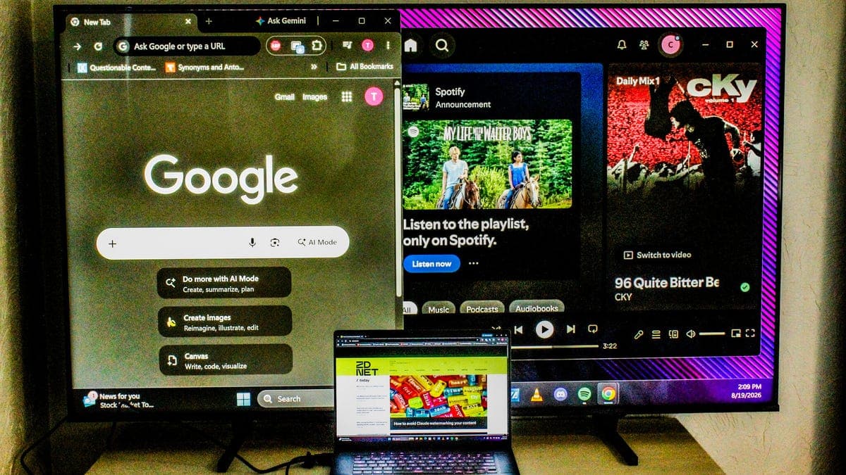Person connecting a laptop to a flat-screen TV with an HDMI cable, using the TV as a second monitor