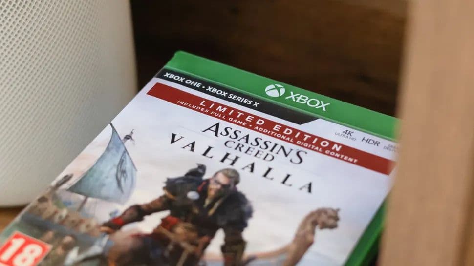 A digital game library interface showing purchased titles with a legal document icon representing ownership rights