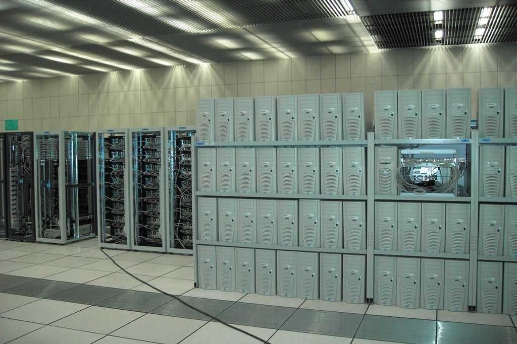 A vintage server rack with indicator lights, representing long-running legacy systems.