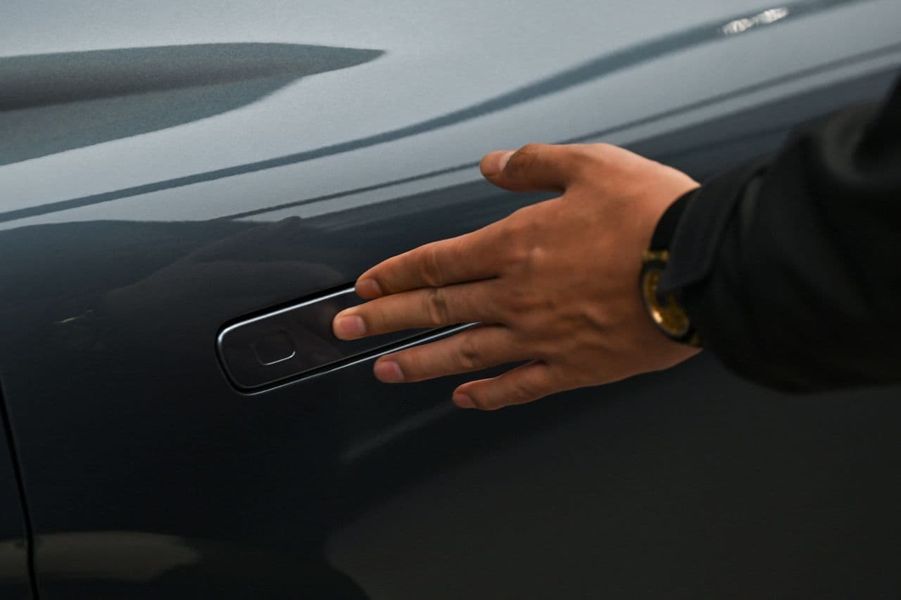 Car dashboard with Bluetooth security device installed under the steering column