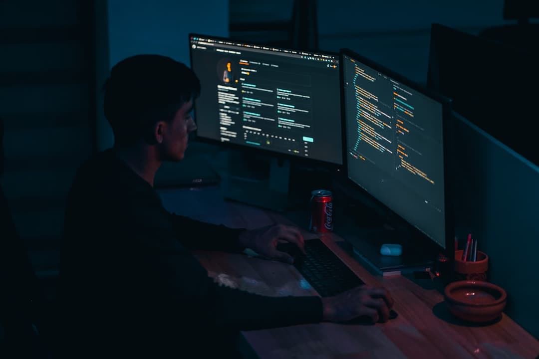 A developer at a computer screen reading AI generated code with focused expression