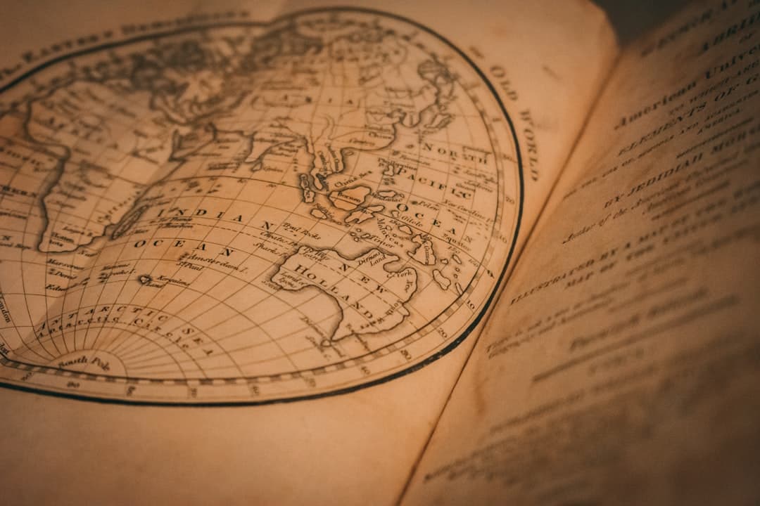 Abstract vector outline of world map continents on a dark background representing minimal code rendering