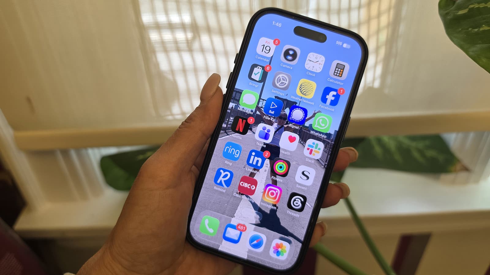 iPhone status bar showing four dots in the top right corner indicating microphone use