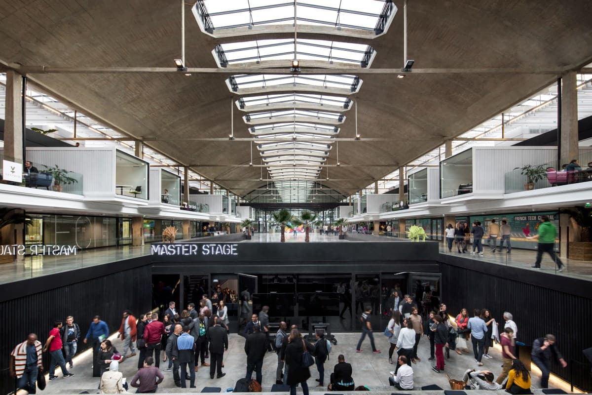 Exterior view of Station F startup campus in Paris during an accelerator event