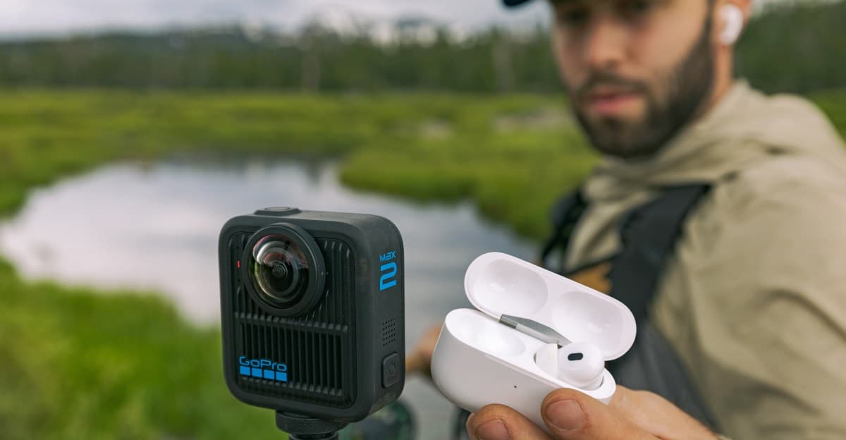 GoPro Max 2 action camera displayed with its accessory bundle including an extension pole and lens caps