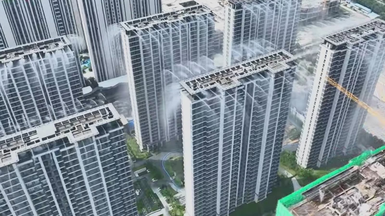 Water spraying from a high-rise rooftop in China for evaporative cooling
