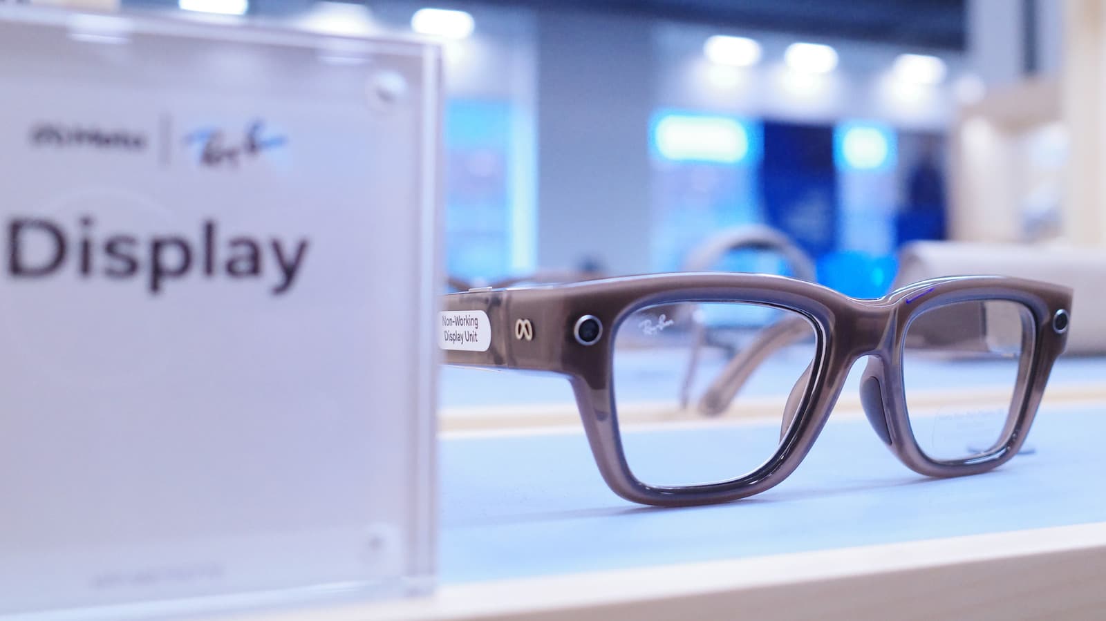 Person wearing Meta Display glasses with the display turned off while driving a car