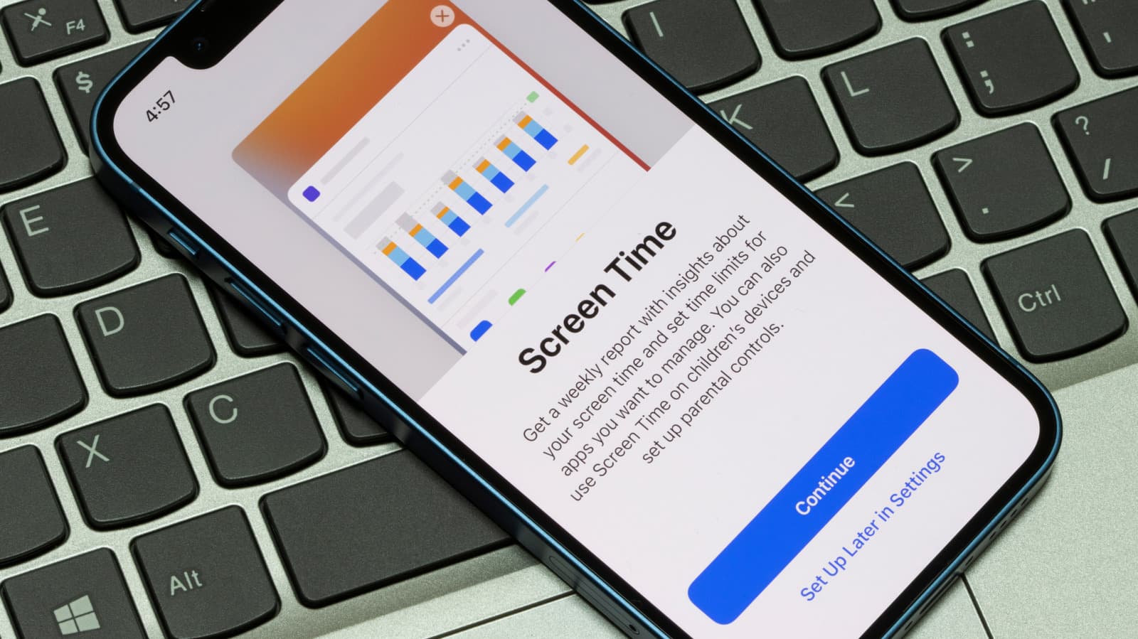 Parent setting up Apple parental controls on an iPhone with an Apple Watch nearby