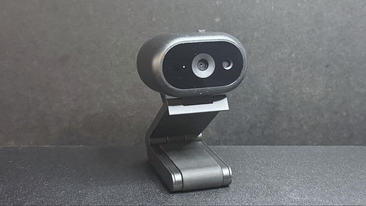 Dell Pro 5 2K webcam on a monitor mount with USB cable in an office setting