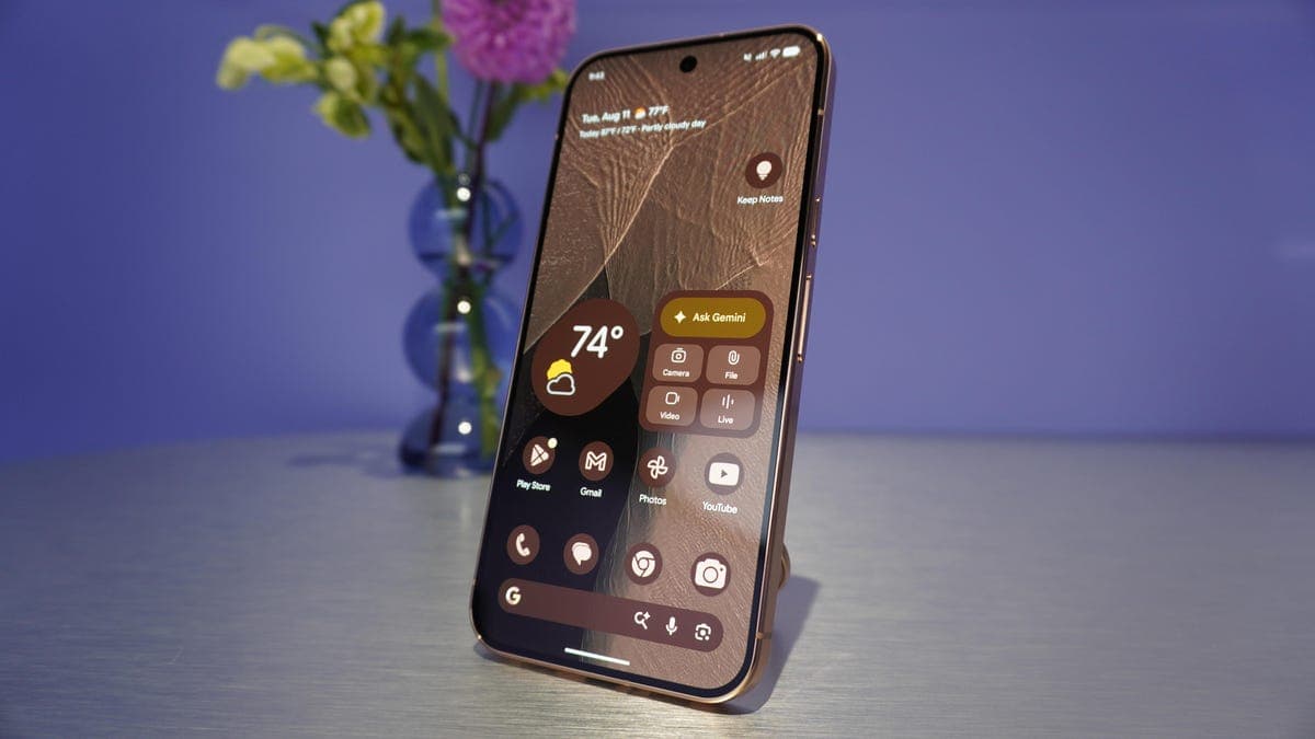 A person holding a smartphone with an AI assistant interface visible on the screen
