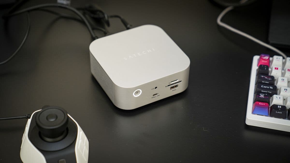 Satechi Thunderbolt 5 CubeDock aluminum dock with front ports and SSD slot on a desk