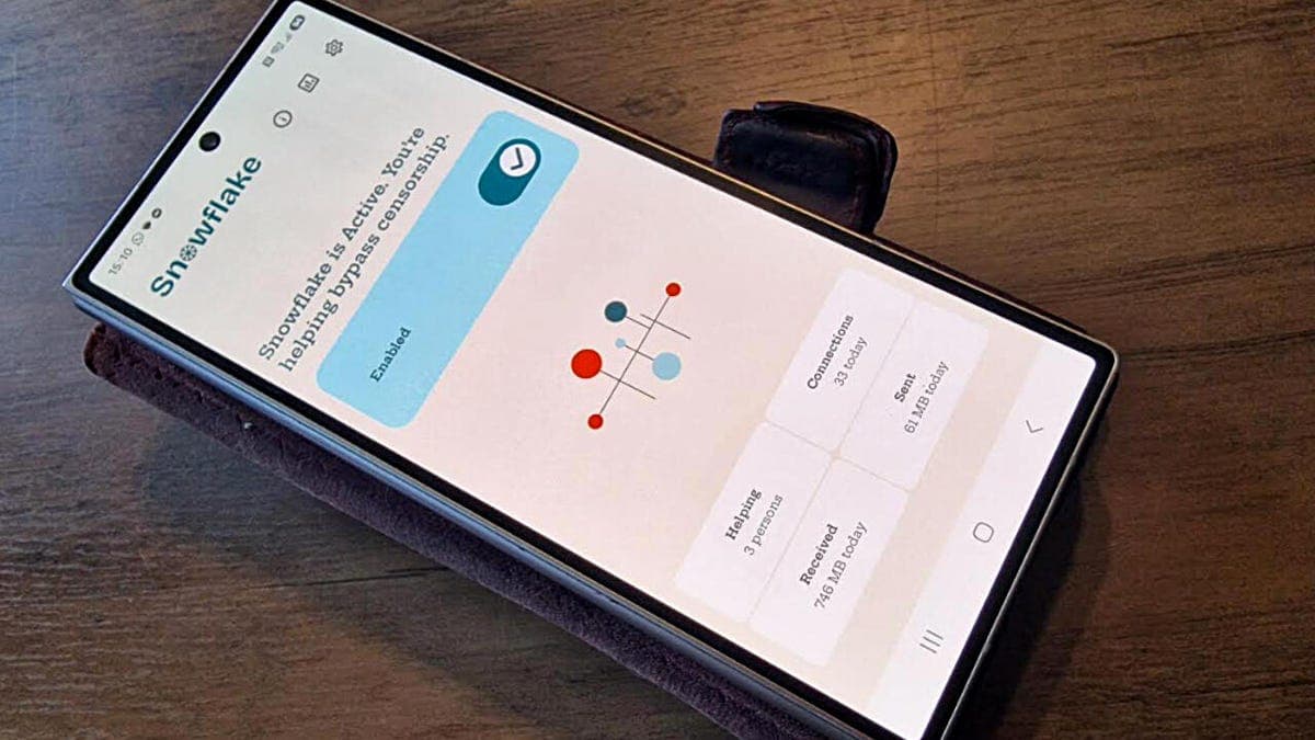 Illustration of a smartphone displaying a Tor relay dashboard with live user connection counts and data transfer metrics