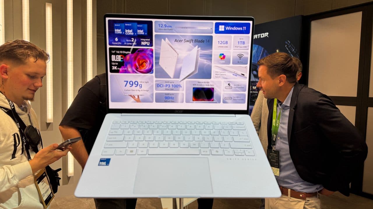 Acer Swift Blade 14 lightweight laptop placed on a desk with a white background